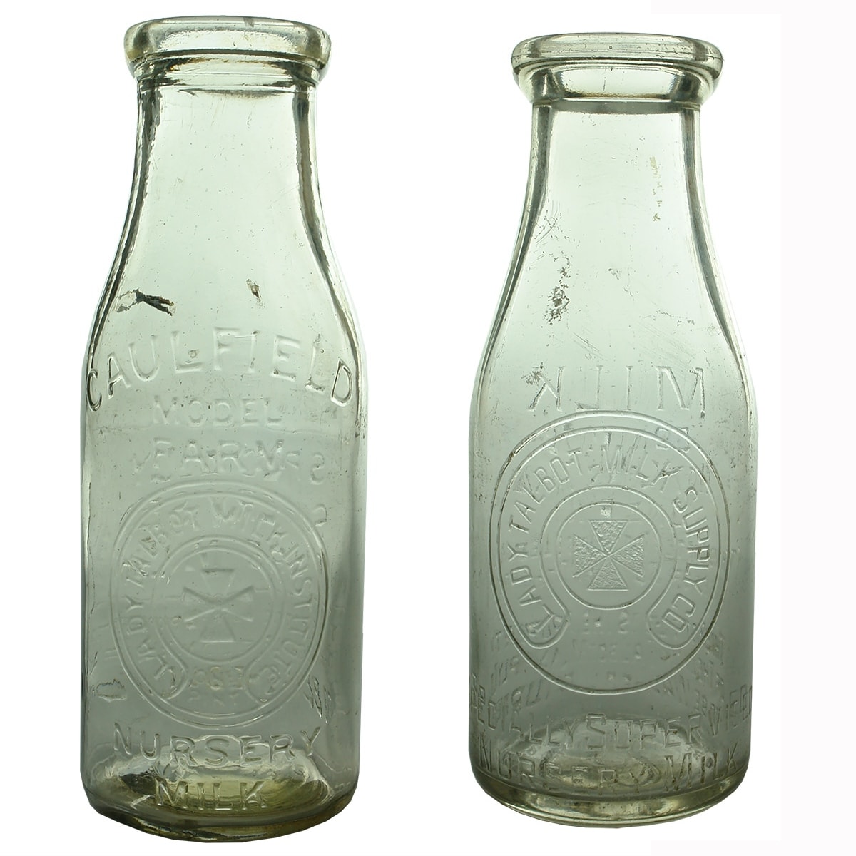 2 Different Lady Talbot Milk Supply Pint Milk Bottles. One with AGM base and the other with 62. (Victoria)
