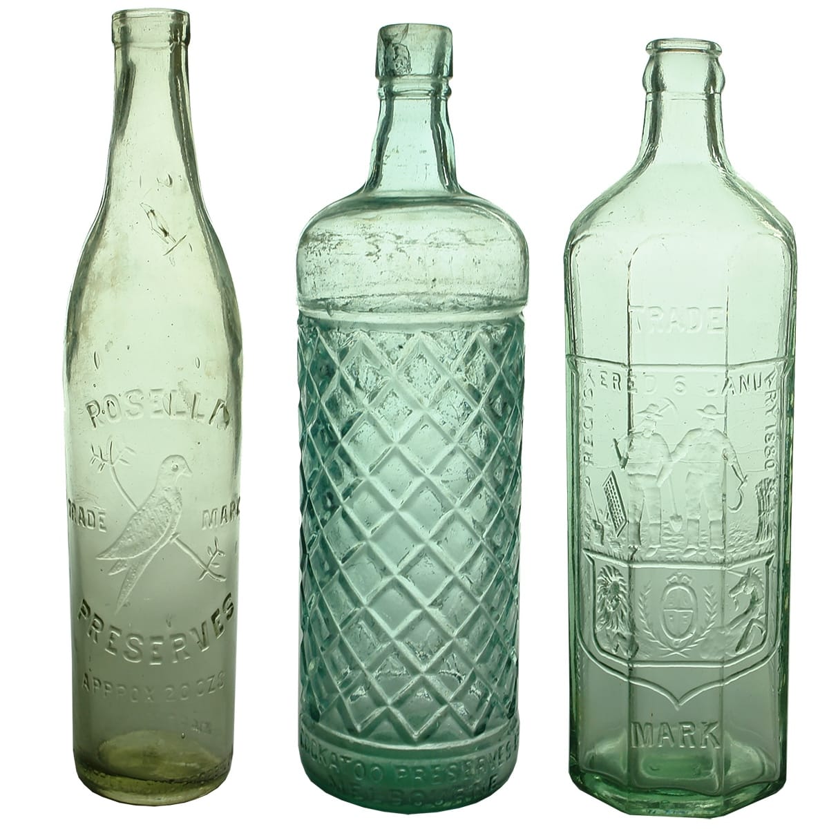 3 Household Bottles: Rosella Preserves 20 oz Sauce; Cockatoo Preserves Ltd Melbourne Cordial; E. Rowlands Pty Ltd Octagonal Crown Seal Cordial. (Victoria)