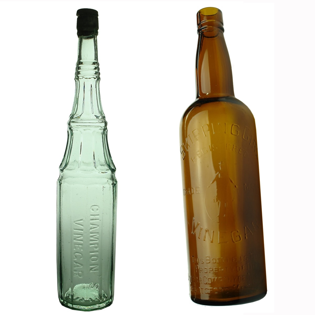 2 Vinegars. Champions Vinegar (Original capsule on top of the stopper has the Knight on Horseback embossed); Skipping Girl Vinegar.
