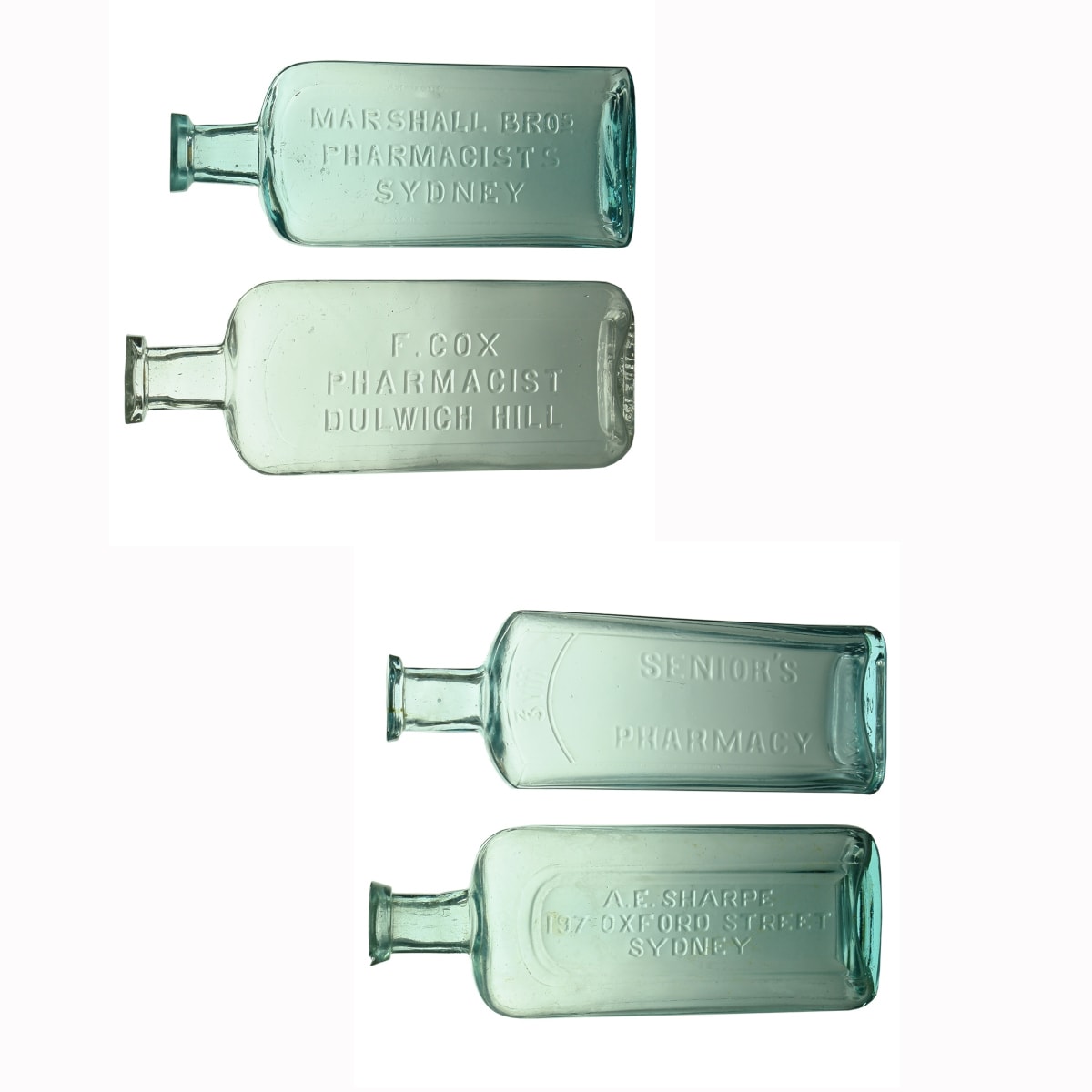 4 Chemists: Marshall Bros., Sydney (160 mm); Senior's Pharmacy (169 mm); A. E. Sharpe, 197 Oxford St., Sydney (173 mm); F. Cox, Dulwich Hill (174 mm). (New South Wales)