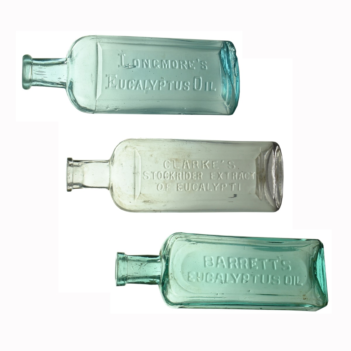 3 Larger Eucalyptus Oil Bottles: Longmore's (156 mm); Clarke's Stockrider (155 mm); Barrett's (151 mm). (Victoria)