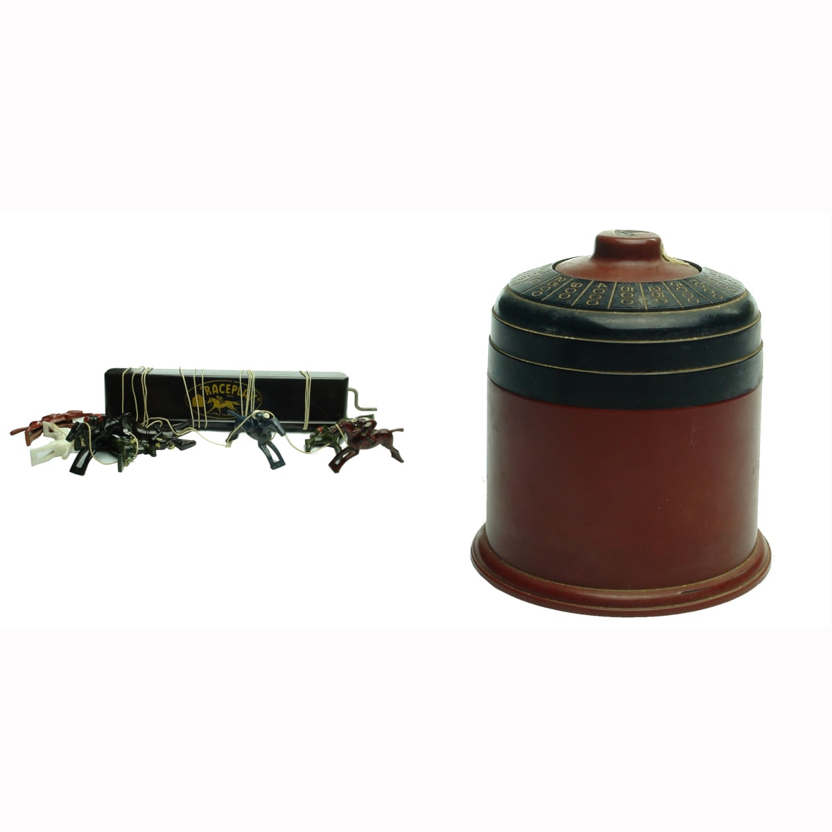 Games: Raceplay by M & L Plastics and a round bakelite container with spinning top that points to various numbers, horse head on top. Dice inside.