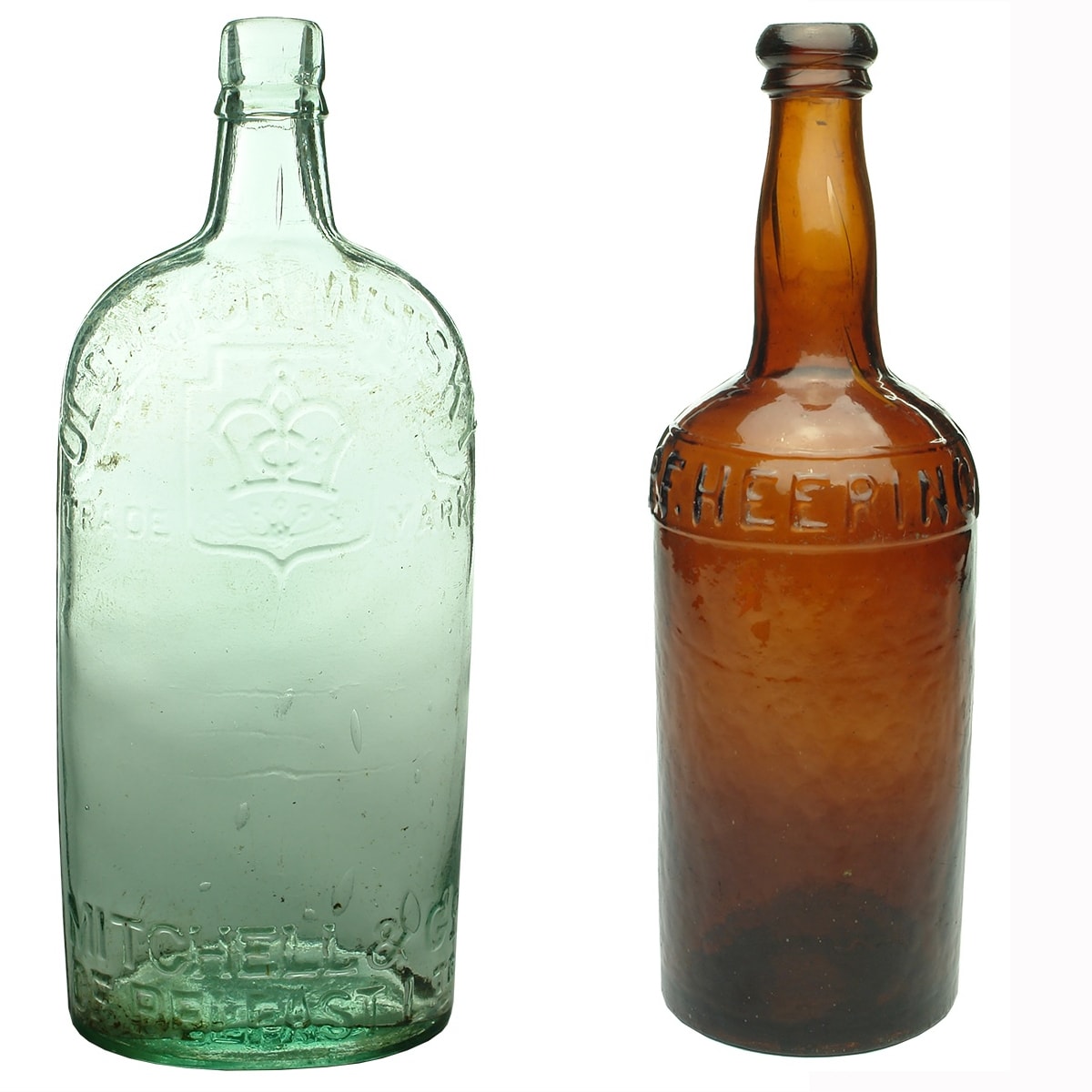 2 Spirits Bottles: Mitchell's Old Irish Whisky Quart; P. F. Heering Cherry Brandy.
