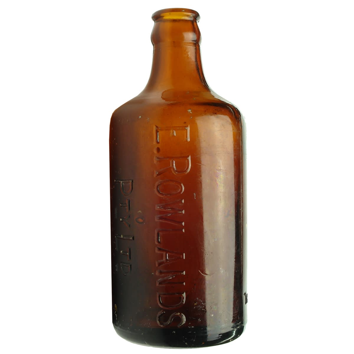 Crown Seal Glass Ginger Beer. E. Rowlands Pty Ltd. Dump. Amber. 10 oz. (Victoria & New South Wales)