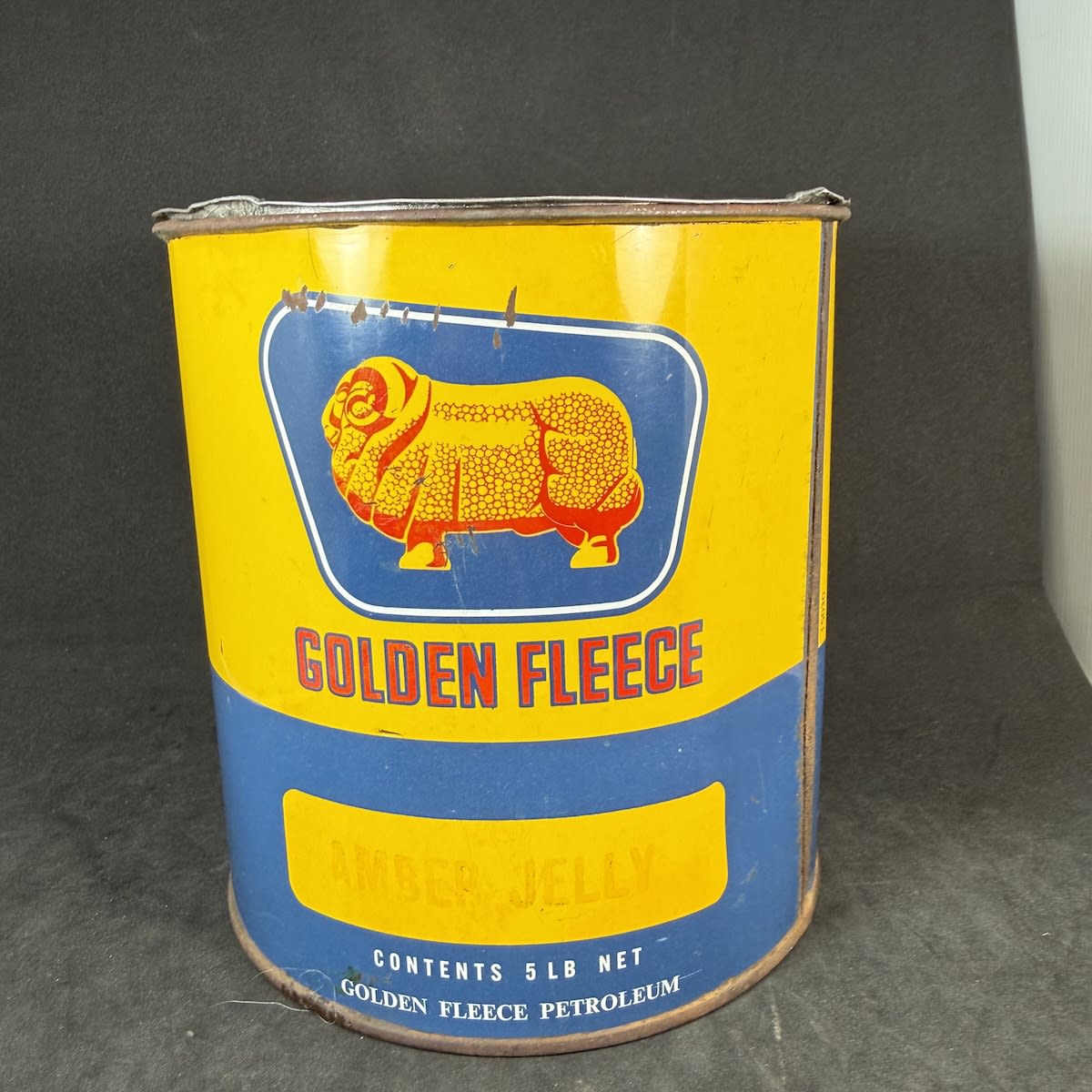 Grease Tin. Golden Fleece Amber Jelly. 5 lb. Golden Fleece Petroleum.