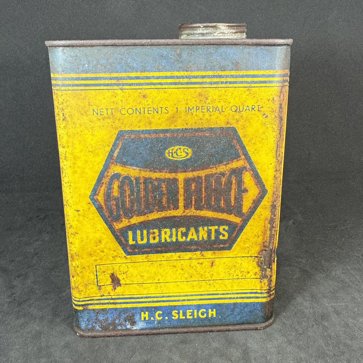 Oil Tin. Golden Fleece Lubricants. H. C. Sleigh. Hexagonal print design.