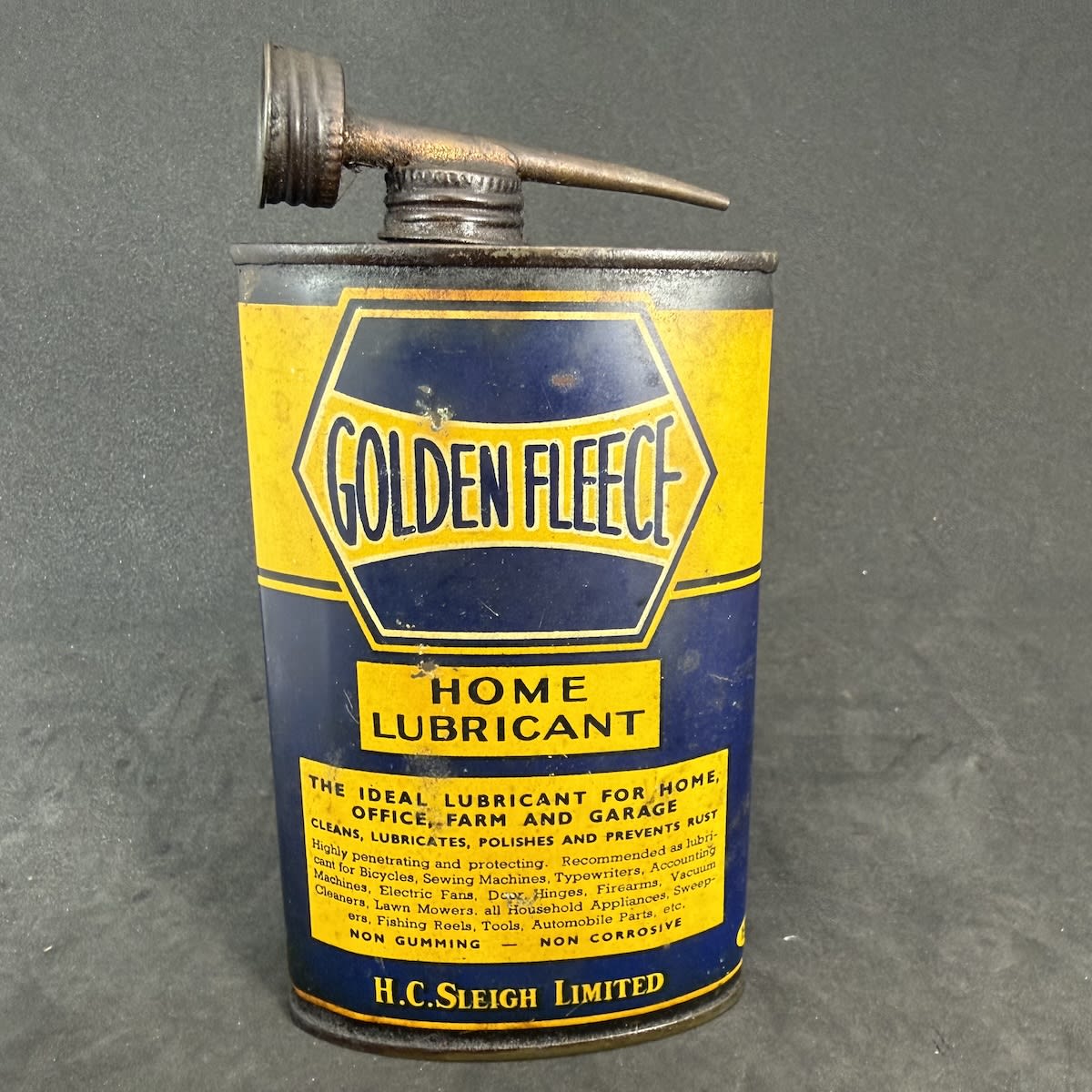 Oil Tin. Golden Fleece Lubricants. Home Lubricant. H. C. Sleigh. Hexagonal print design. Oval tin. 8 oz size.