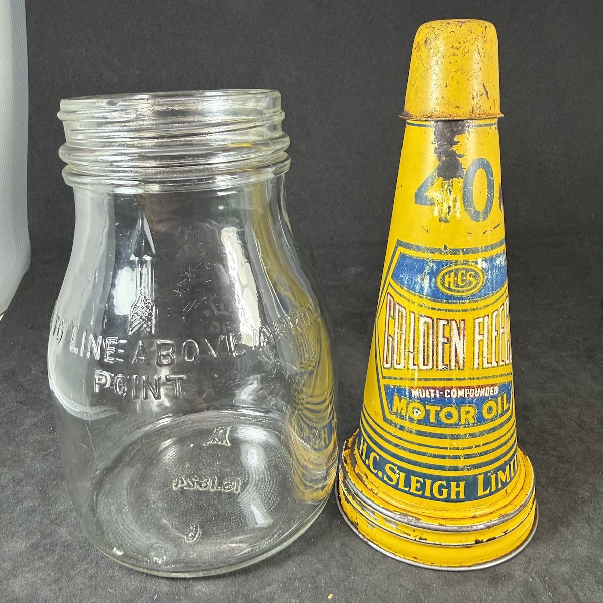 Oil Bottle & Tin Pourer. Golden Fleece HCS Multi Colmpounded Motor Oil. 40. H. C. Sleigh Limited. Hex design. Generic 1 Pint bottle.