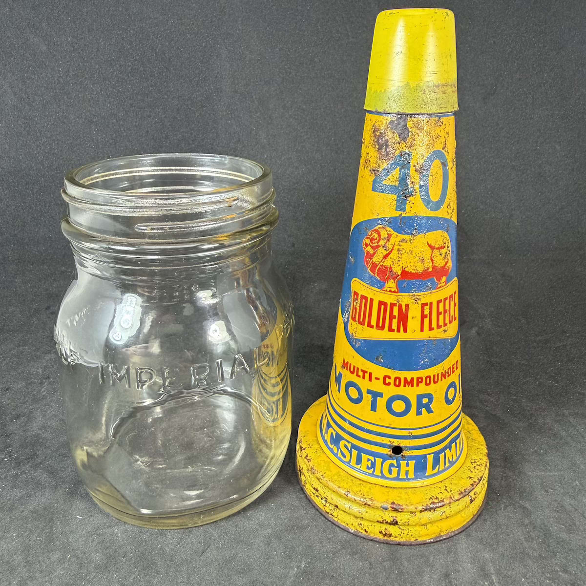 Oil Bottle & Tin Pourer. Golden Fleece Multi-compounded Motor Oil. 40. H. C. Sleigh Limited. Generic Half Imperial Pint Bottle.