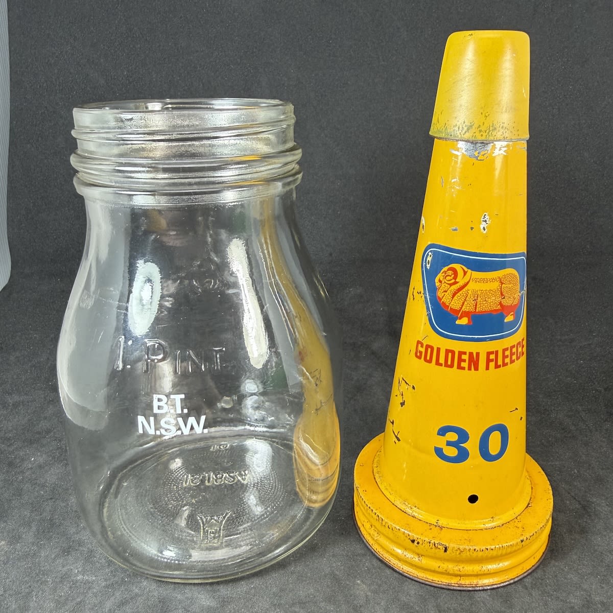 Oil Bottle & Tin Pourer. Golden Fleece. Ram. 30. Generic Pint bottle.
