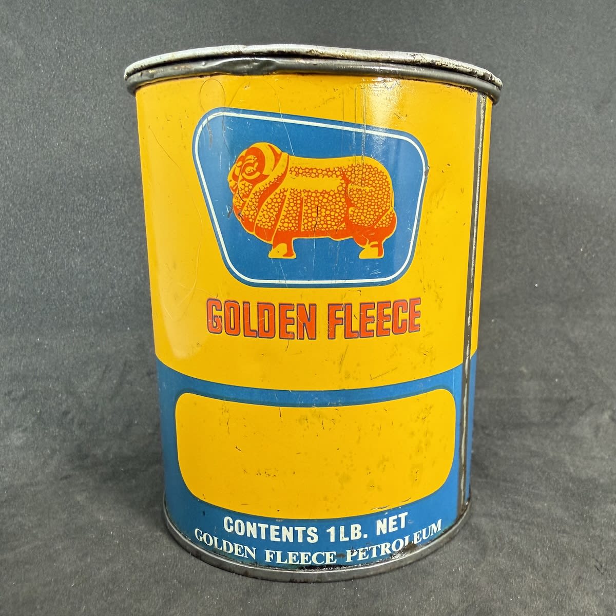 Golden Fleece Grease Tin. 1 lb. Golden Fleece Petroleum.