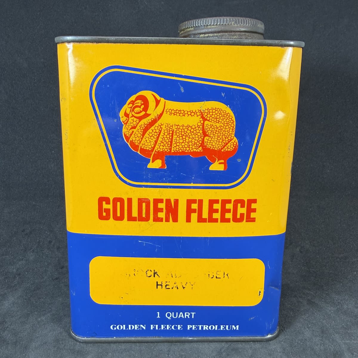 Oil Tin. Golden Fleece. Shock Absorber Heavy. 1 Quart. Golden Fleece Petroleum.