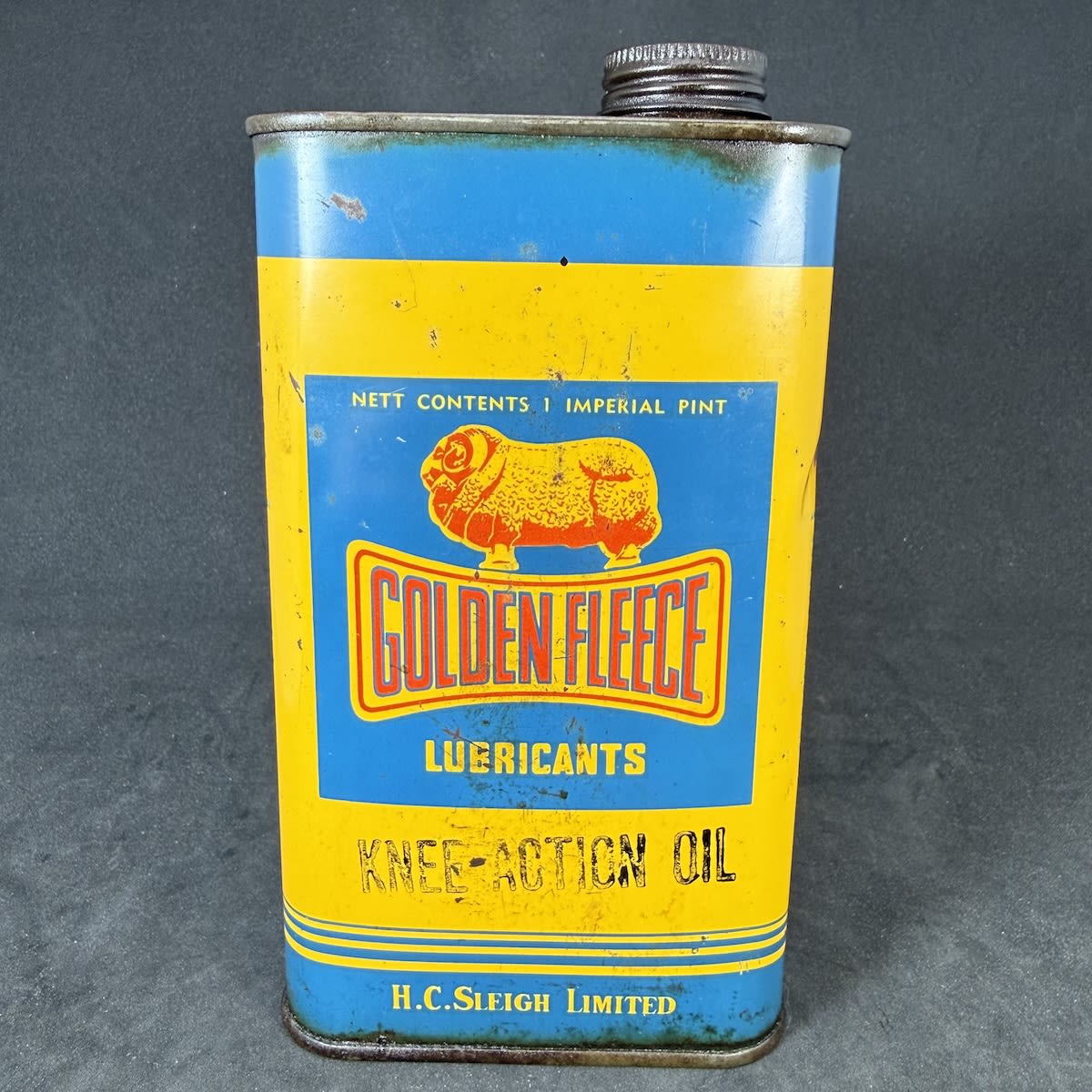 Oil Tin. Golden Fleece Lubricants. Knee-Action Oil. H. C. Sleigh Limited. Imperial Pint.