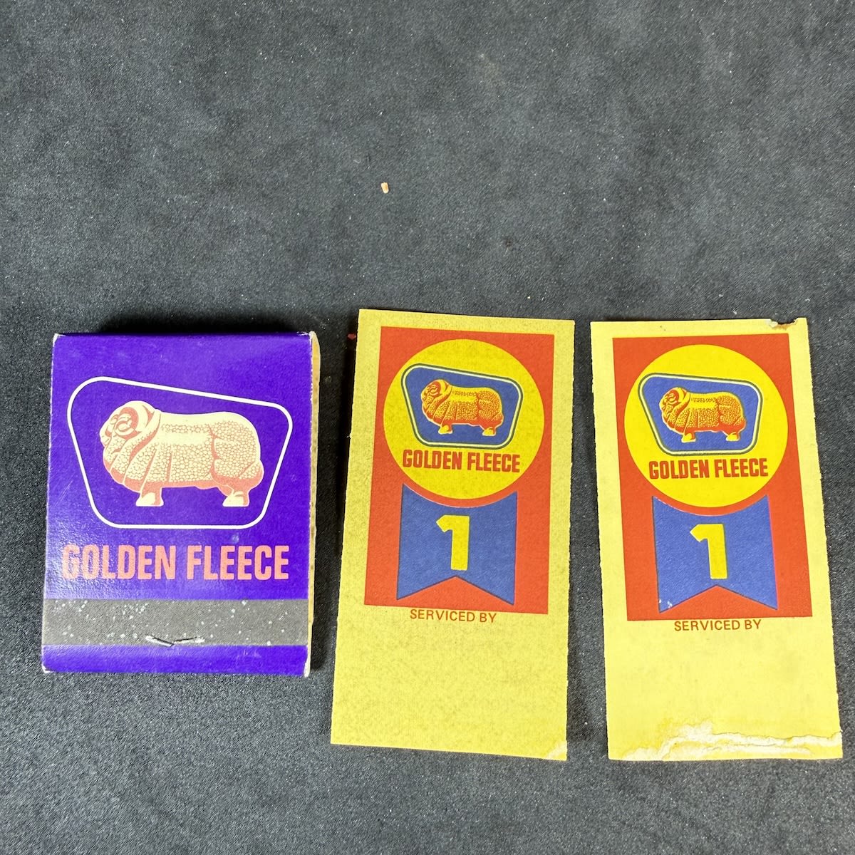 3 Pieces of Golden Fleece Ephemera: Matchbook for Hodgson's restaurant/motel, Mildura. Golden Fleece; 2 unused service reminder windscreen tickets.
