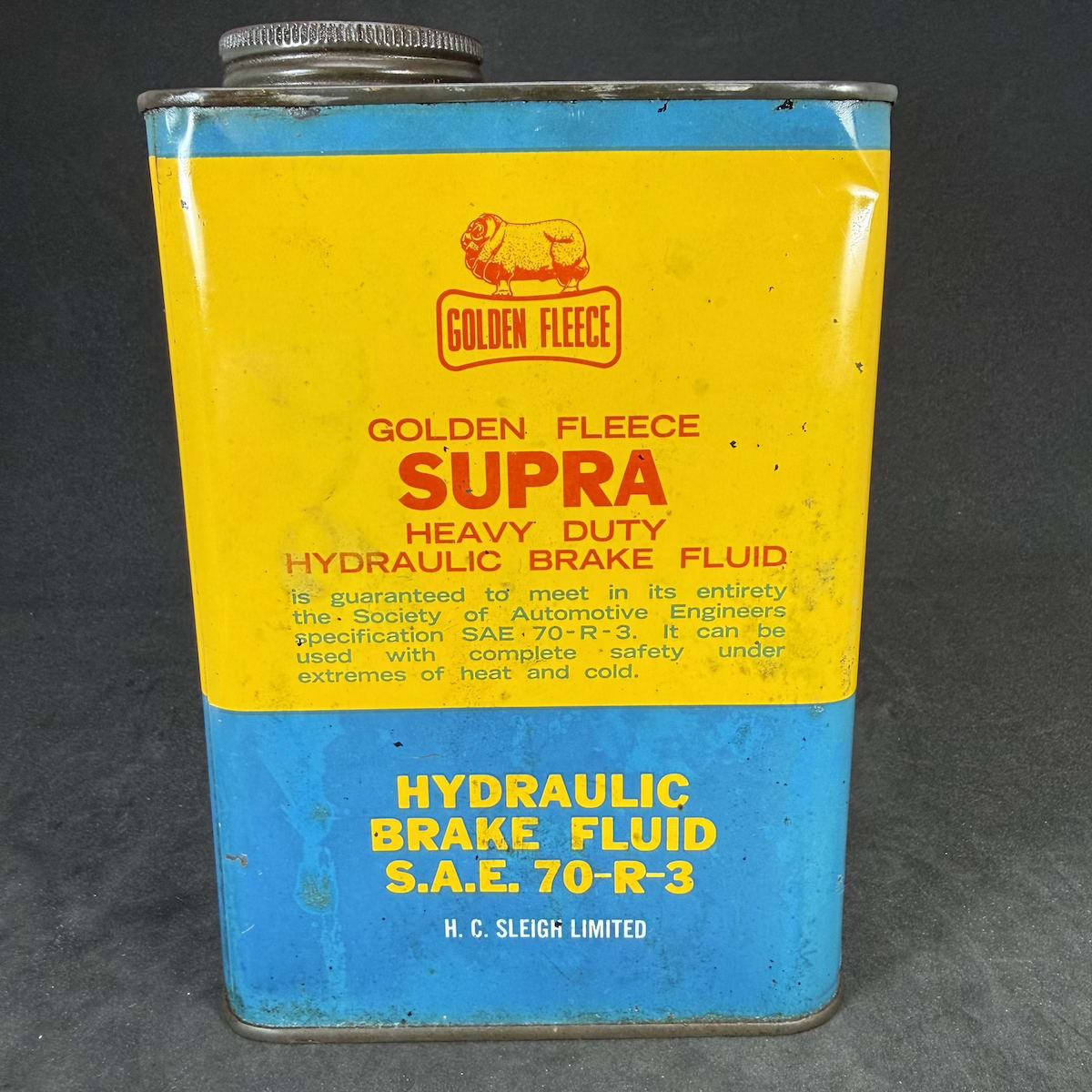 Oil Tin. Golden Fleece. H. C. Sleigh Limited. Supra Heavy Duty Hydraulic Brake Fluid. Golden Fleece embossed cap. Quart.