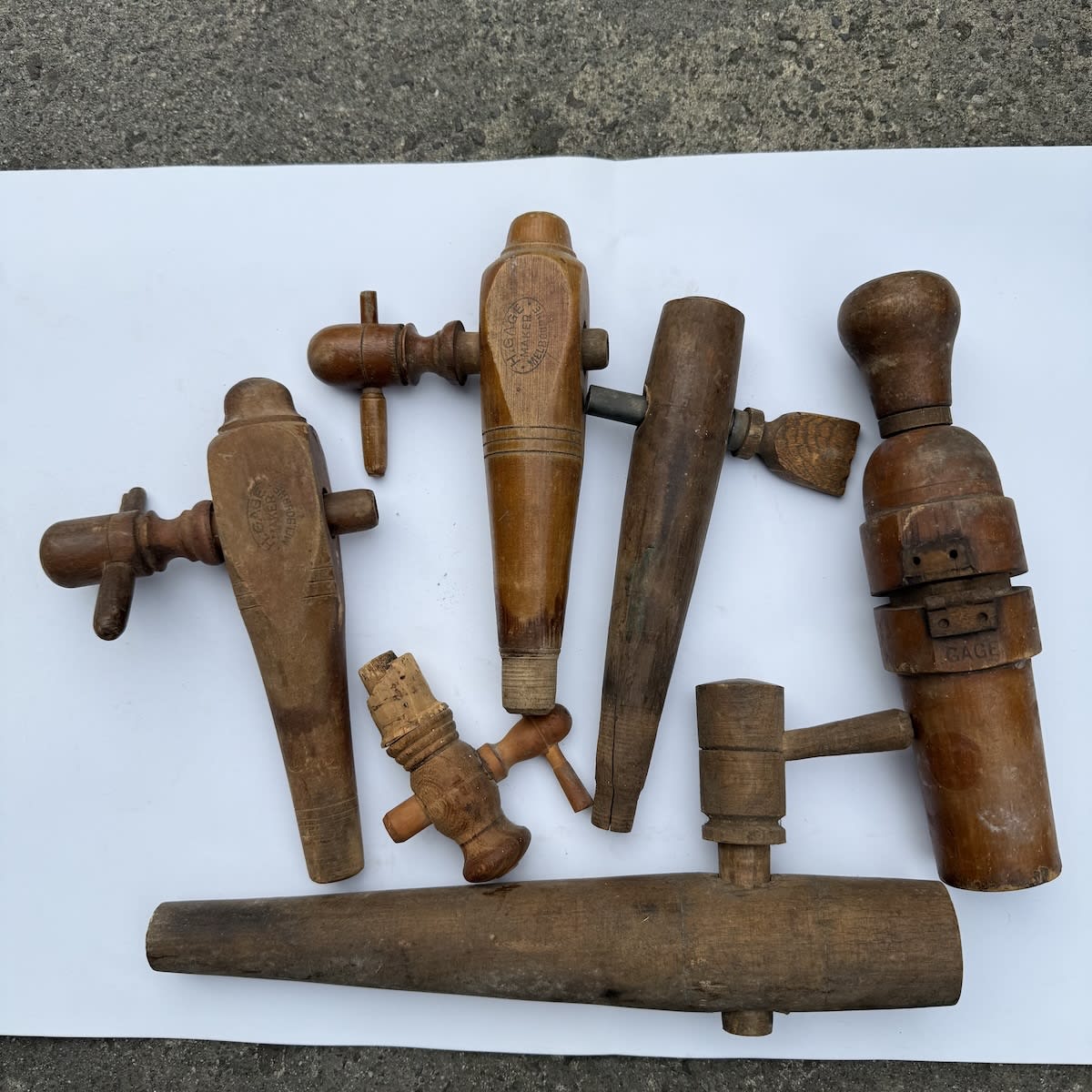6 Wooden Items. 5 x Barrel taps and a Corker. Gage Melbourne and others.