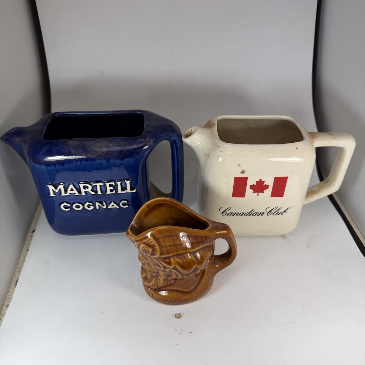3 Advertising Water Jugs: Martell Cognac; Canadian Club; Small size The McCallum, Elischer made.