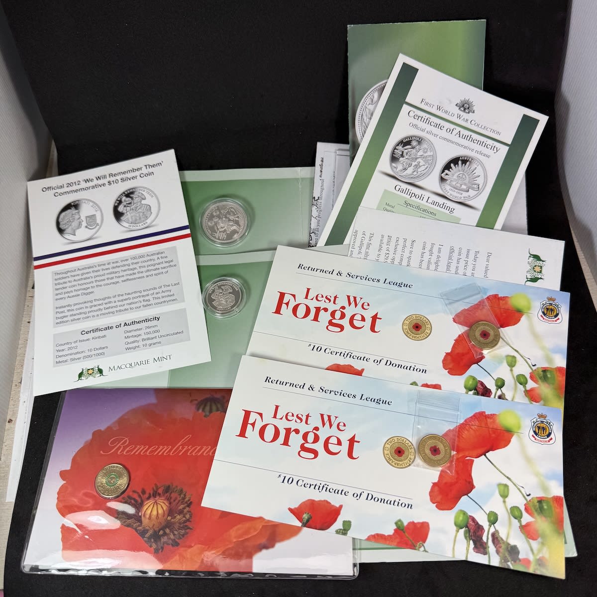 5 Commemorative Coins. Macquarie Mint Gallipoli Landing 33%, 16.5 gram; Macquarie Mint Kiribati $10 50% Silver Coin; 2 x 2012 $2 with $10 donation certificates; 2014 $2 on First Day Cover.