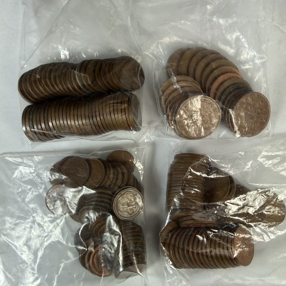 170 Copper Coins! 50 Australian 1 cent (130 grams) 50 Australian 2 cent (260 gms) 50 UK 1 Pence (179 gms) 20 UK 2 Pence (144 gms).