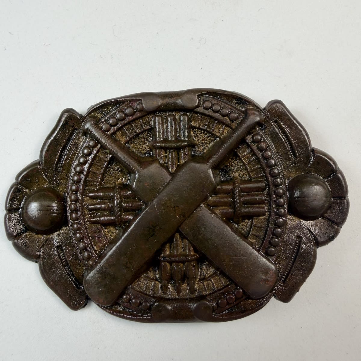Cricket Belt Buckle / Sash Buckle. Fancy shape with Crossed Bats, Crosses stumps and two balls.