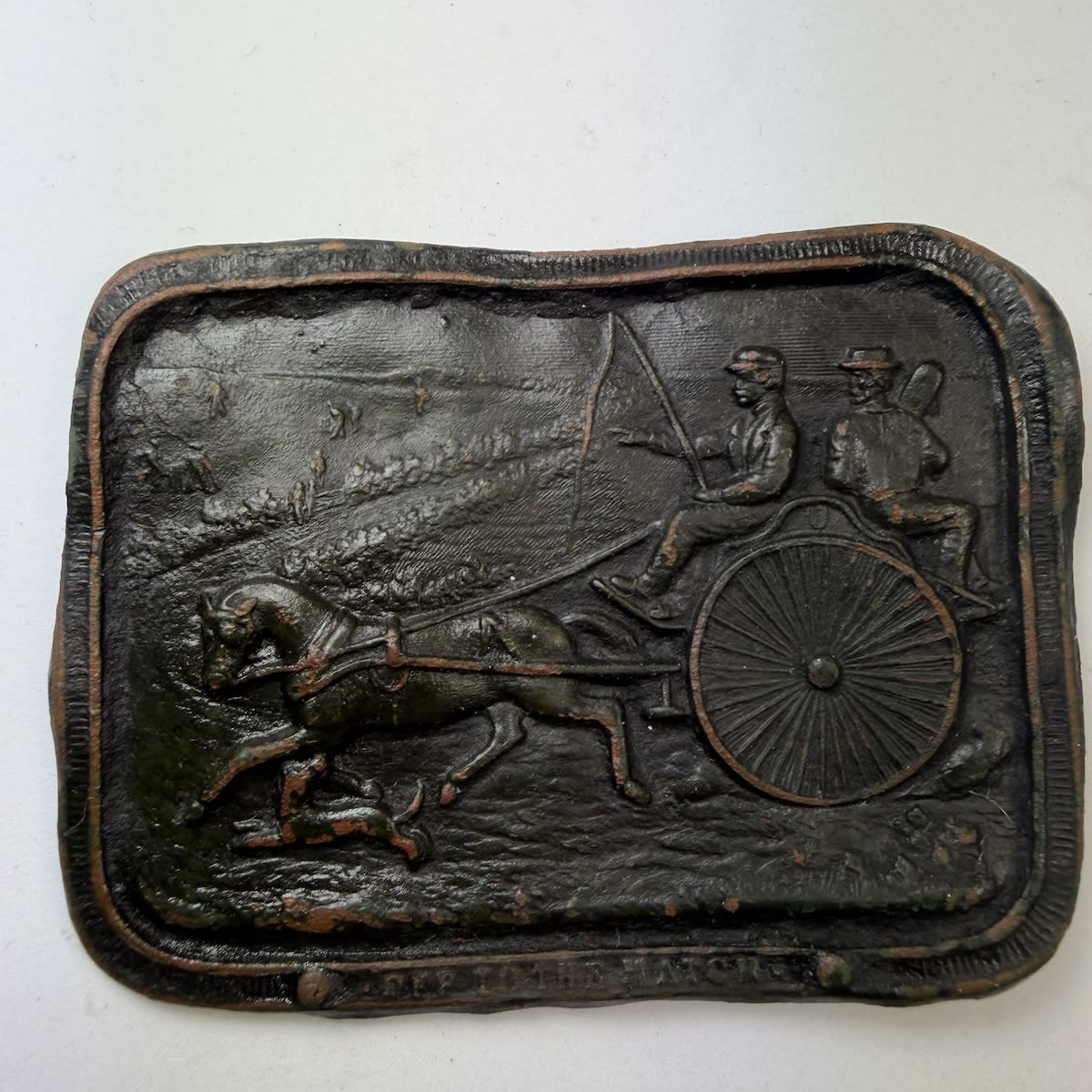 Cricket Belt Buckle / Sash Buckle. Off to the Match. Two men on a buggy (one with a bat over his shoulder) being drawn by a Horse who in turn is being harassed by a small dog!