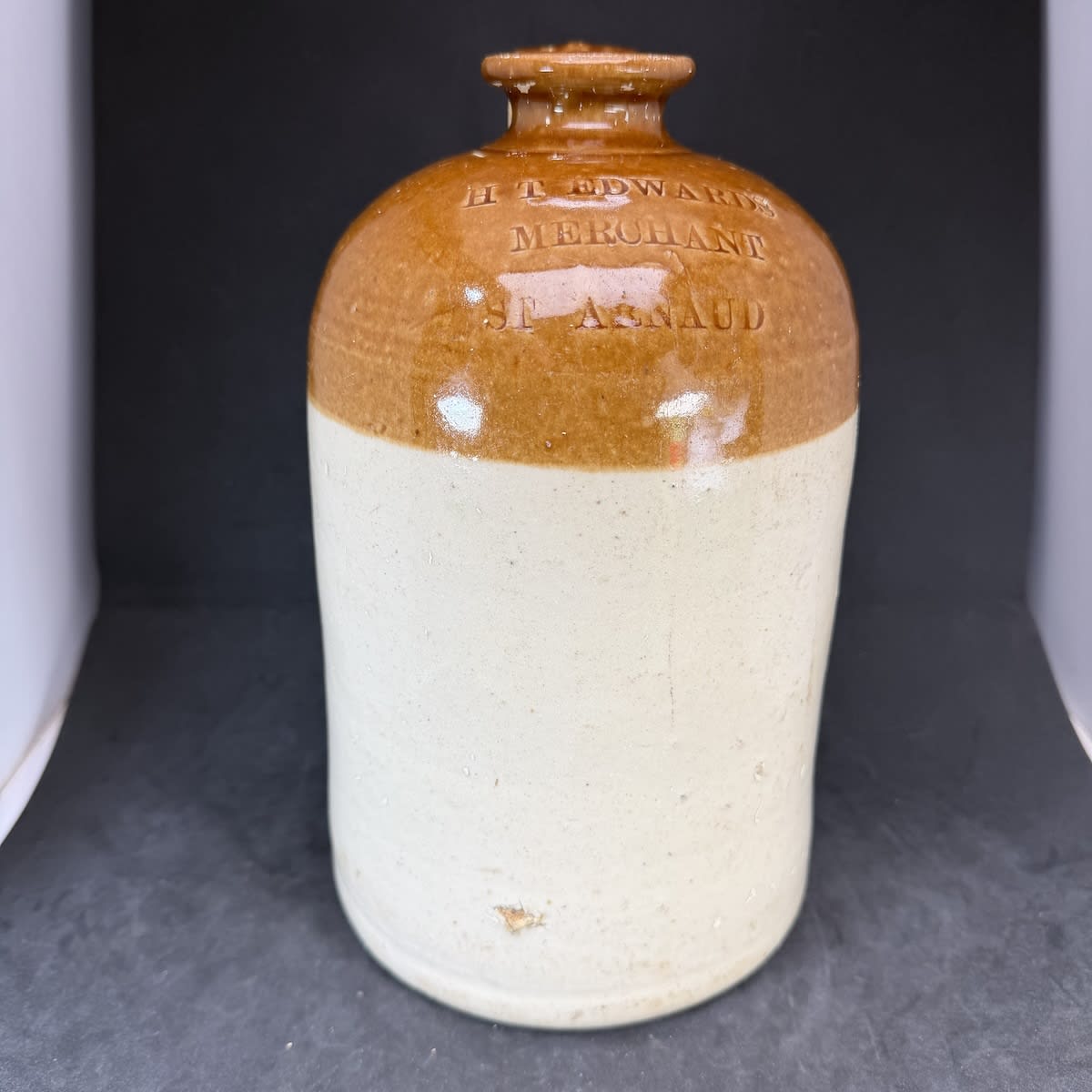Demijohn. H. T. Edwards, Merchant, St Arnaud. Impressed. Half Gallon. (Victoria)