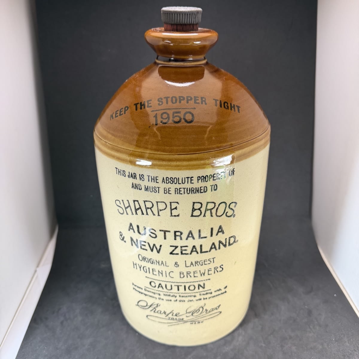 Demijohn. Sharpe Bros, Australia & New Zealand. 1950 dated. Pearsons Chesterfield pottery. Internal Thread.