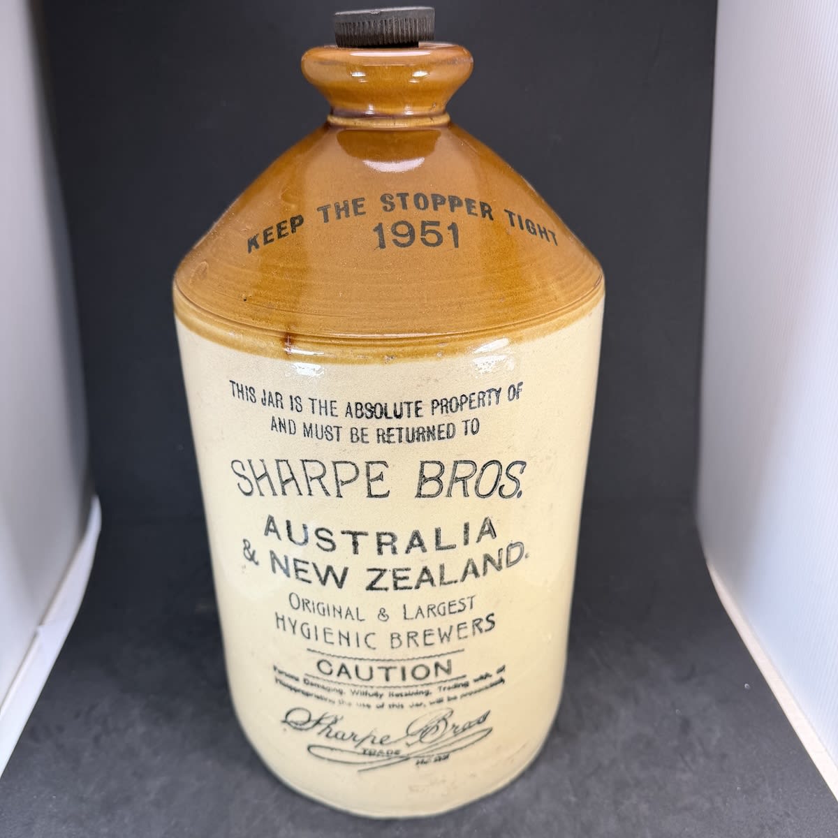 Demijohn. Sharpe Bros, Australia & New Zealand. 1951 dated. Pearsons Chesterfield pottery. Internal Thread.