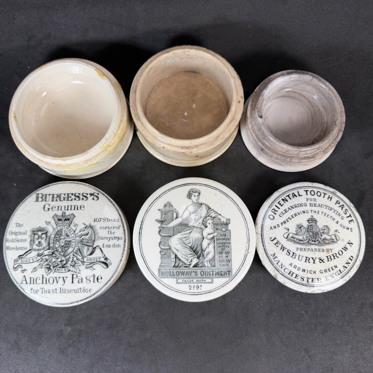 3 Larger Black & White Pot Lids: Burgess's Anchovy Paste; Holloways Ointment 2/9 size Oxford Street; Jewsbury & Brown Oriental Tooth Paste.