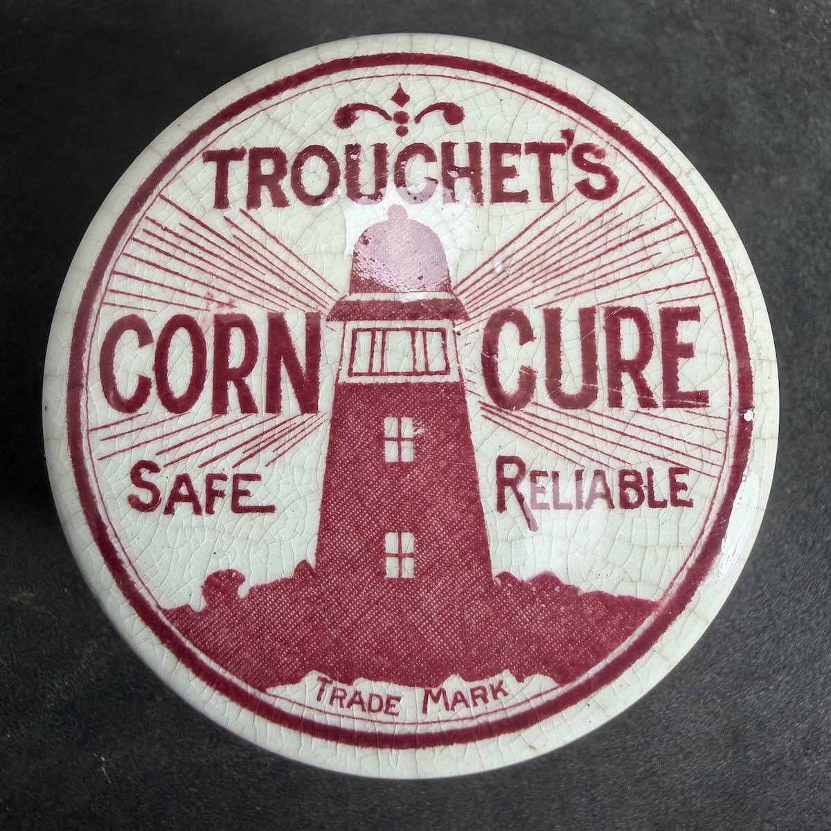 Pot Lid. Trouchet's Corn Cure. Lighthouse. Red Print. (Western Australia)