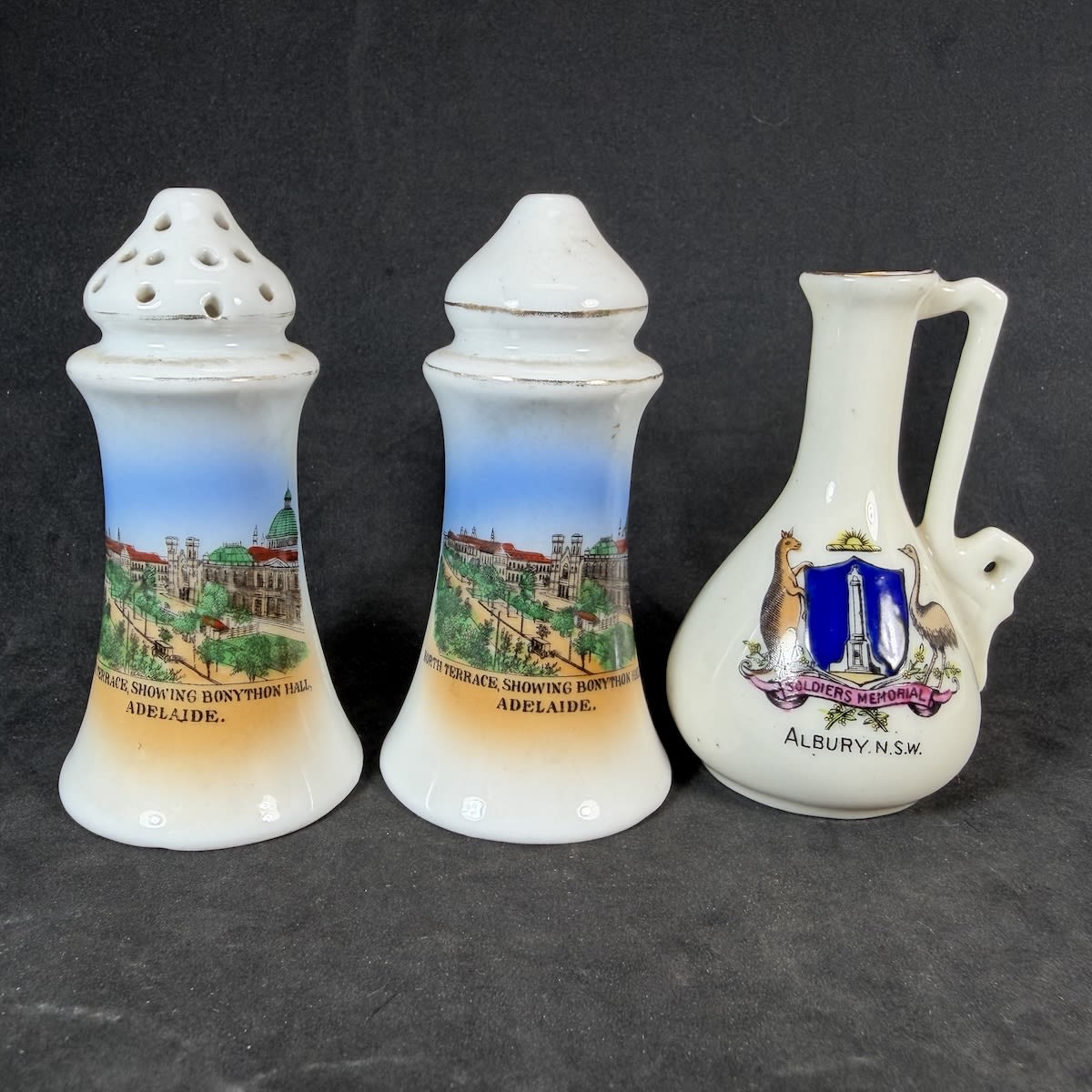 3 Souvenirware Pieces: Salt & Pepper Shakers, North Terrace showing Bonython Hall, Adelaide; Sodiers Memorial, Albury. (South Australia & New South Wales)