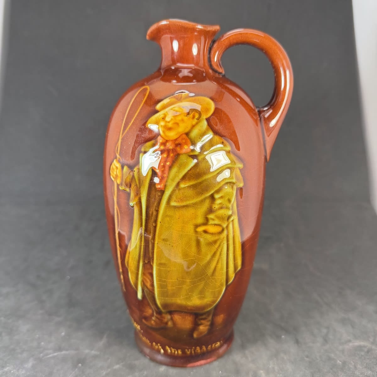 Kingsware Jug. Tony Weller, Beware of the Vidders. Dewar's Imperial. Royal Doulton. Medium/Light colours.