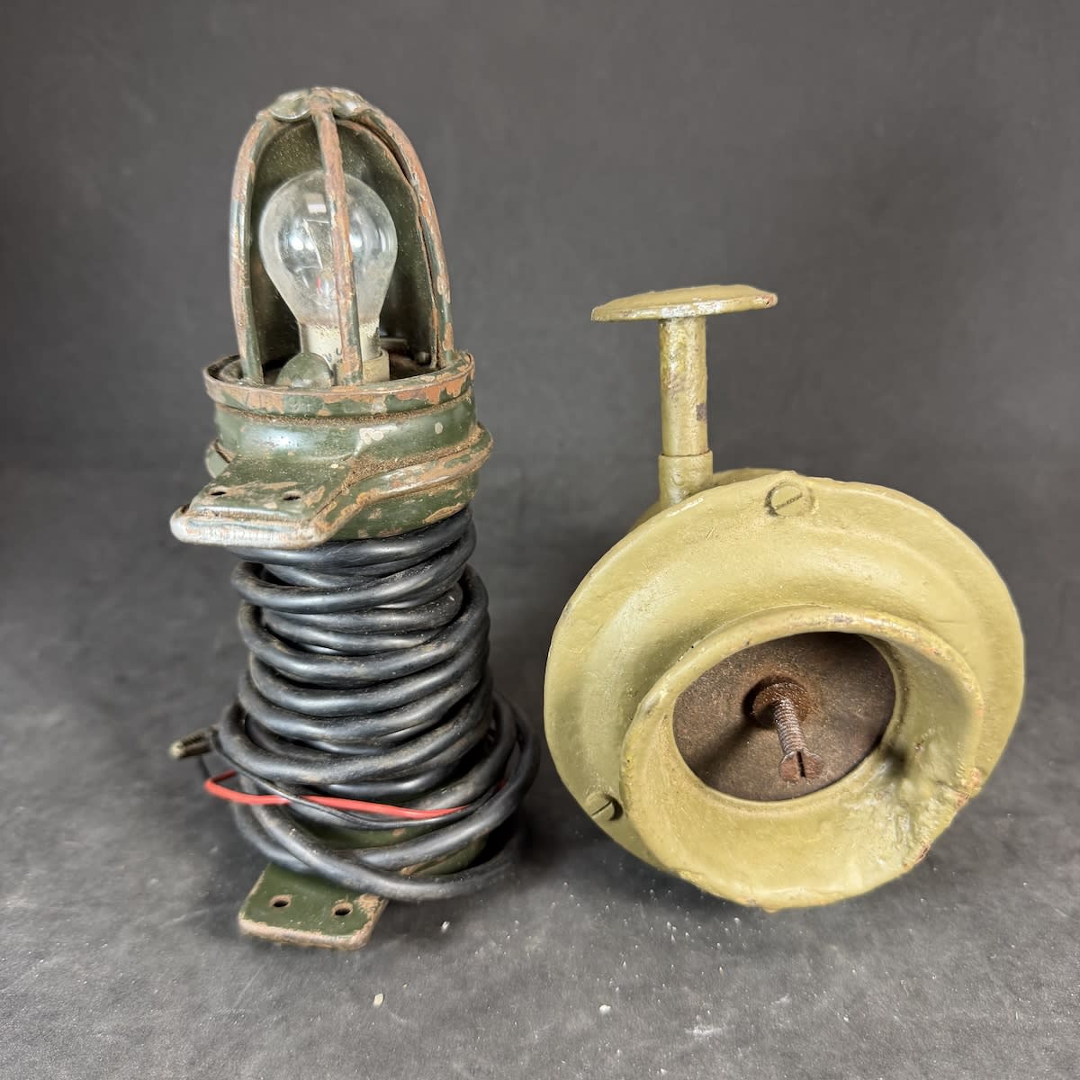 2 Items: 12 volt lamp with bracket (not tested); Mechanical Klaxon horn, rough and beaten up, but works!