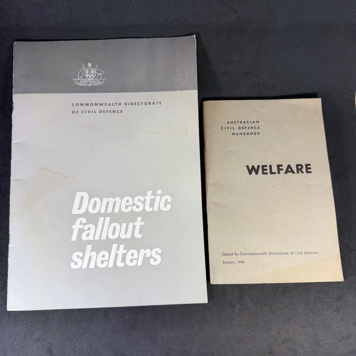 2 Australian Civil Defence Handbooks: Welfare 1964 and Domestic fallout shelters 1970.