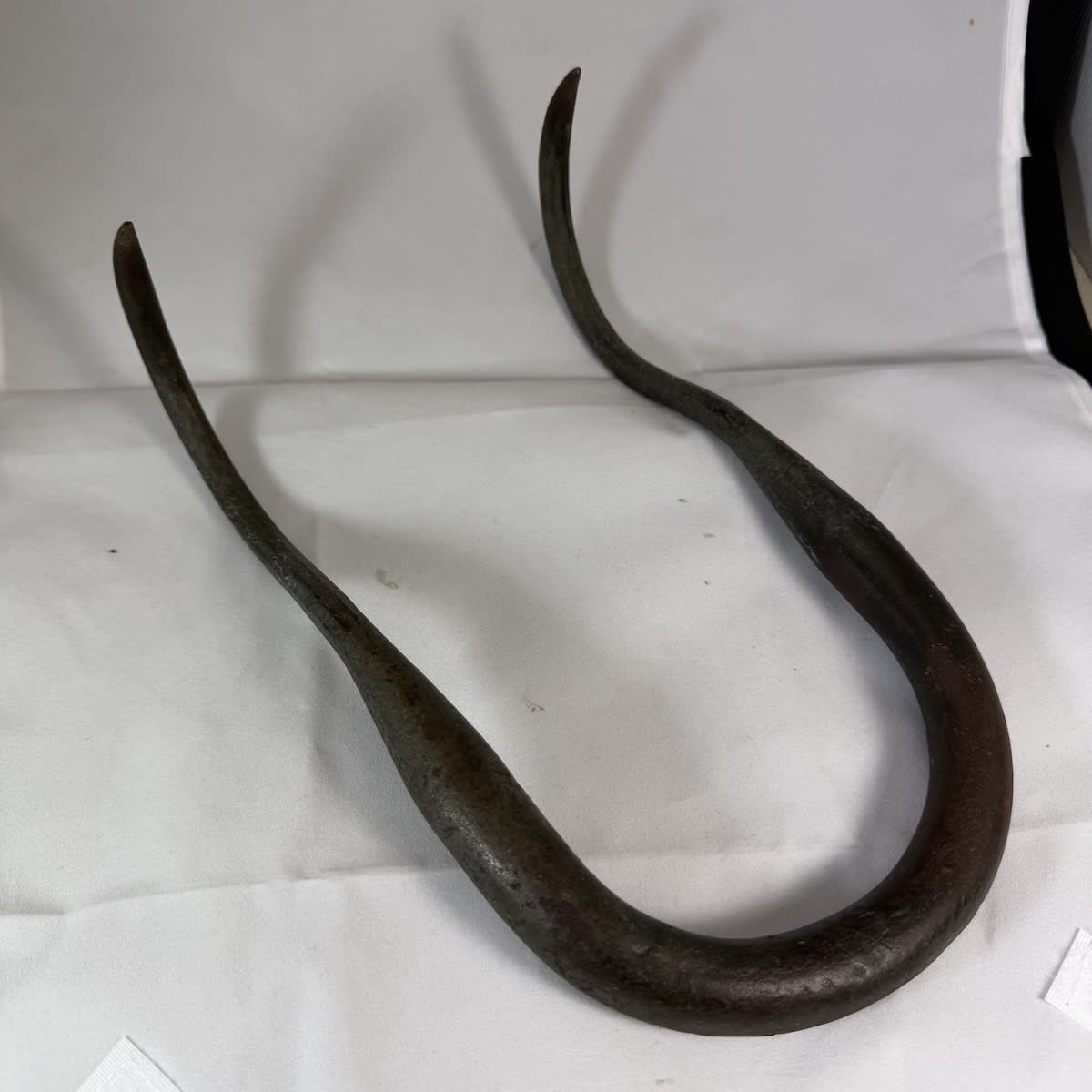Cast Iron Bale Hook. Looks like Maddock stamped to side.