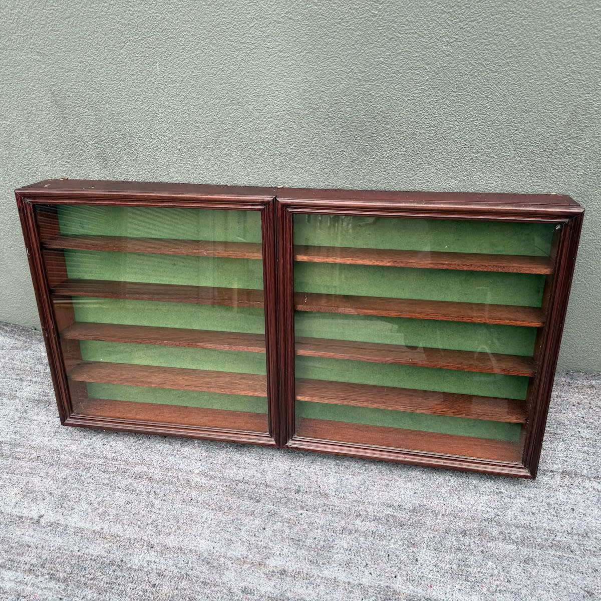 Large display cabinet. Made for model cars but would certainly suit pot lids, small bottles, tins etc. 1105 x 580 x 120 mm  (Not for Post. Pickup only or courier arranged by the winning bidder).