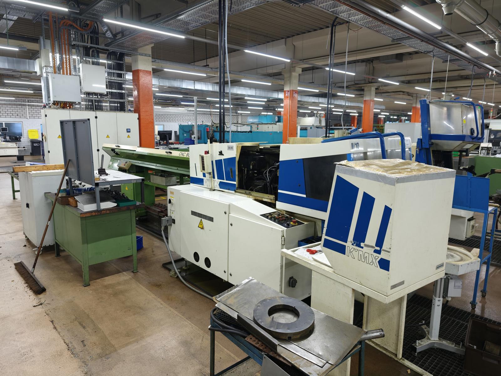 CNC Automatic Lathe (Swiss-Type) with Bar Feeder MANURHIN KMX 226 | 1993