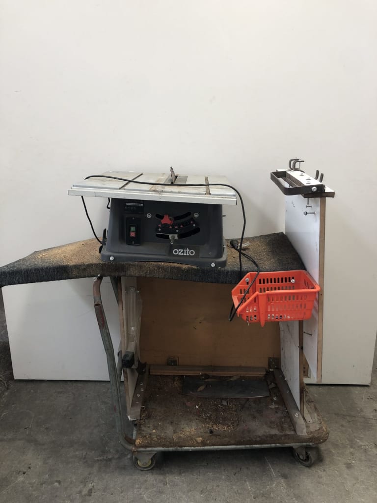 OZITO 254MM TABLE SAW W/ MOBILE STAND — NZ auction result