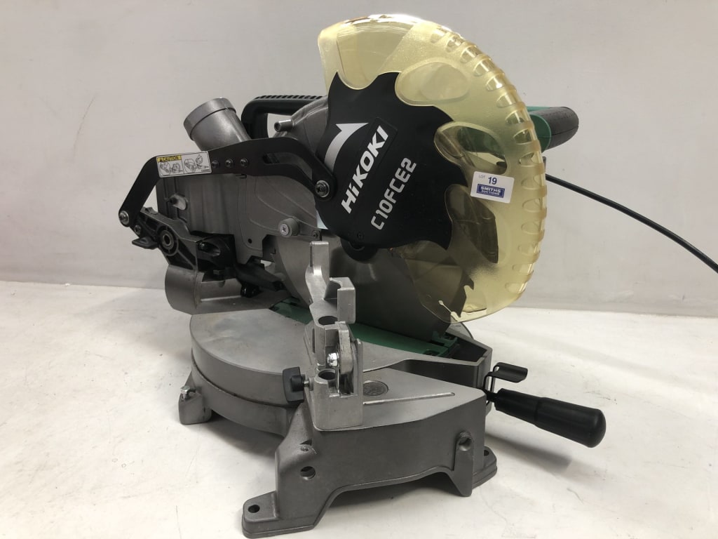 HIKOKI C10FCED 255MM COMPOUND MITRE SAW — NZ auction result