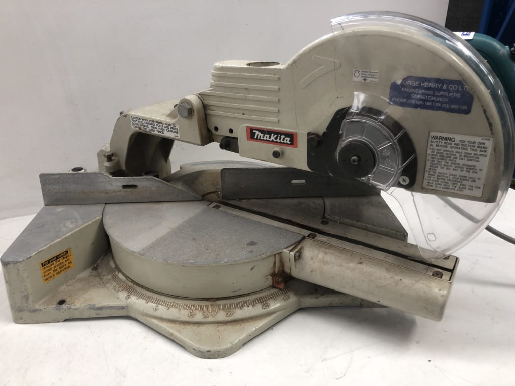 MAKITA 255MM COMPOUND SLIDE MITRE SAW — NZ auction result