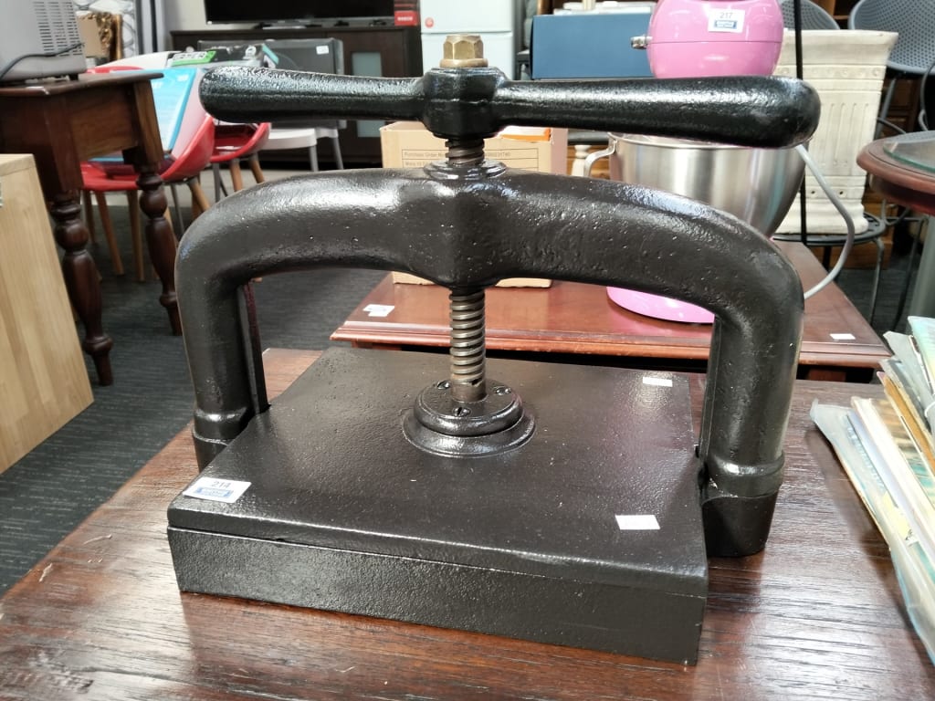CAST IRON BOOK PRESS — NZ auction result