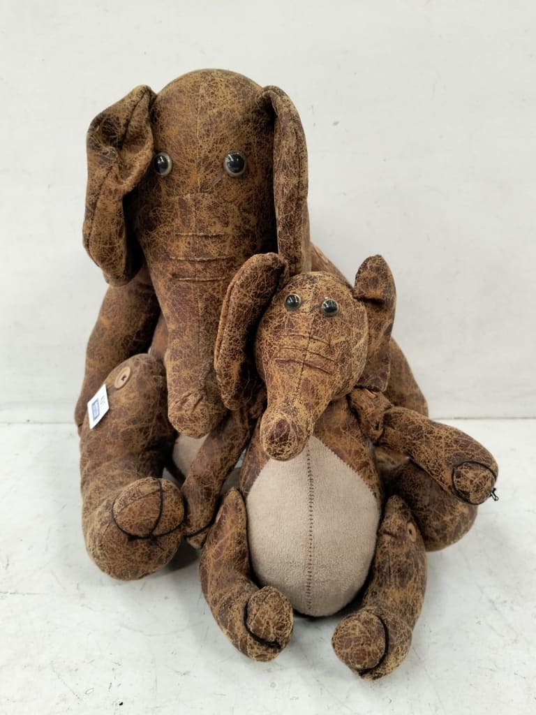2 ELEPHANT DOORSTOPS — NZ auction result
