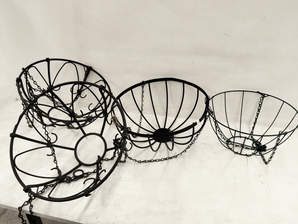4 HANGING PLANTERS — NZ auction result