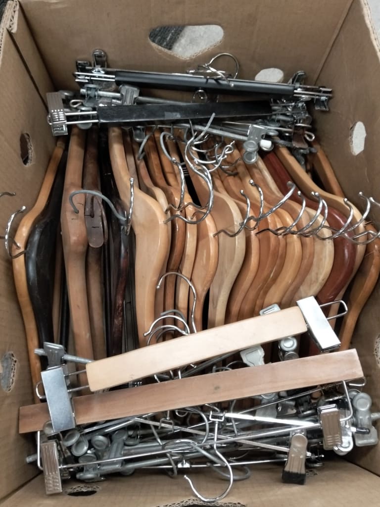 CARTON OF ASSORTED COAT HANGERS — NZ auction result