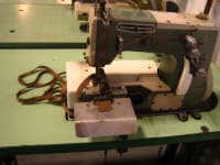 Large quantity of new and used sewing machines plus shoe manufacturing equipment. - 7
