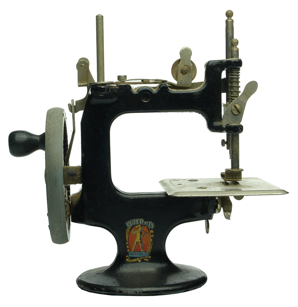 Peter Pan Model O Sewing Machine Cast Iron - ABCR Auctions